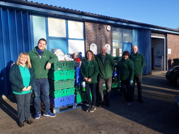 Wirral food bank volunteers stood outside the food bank