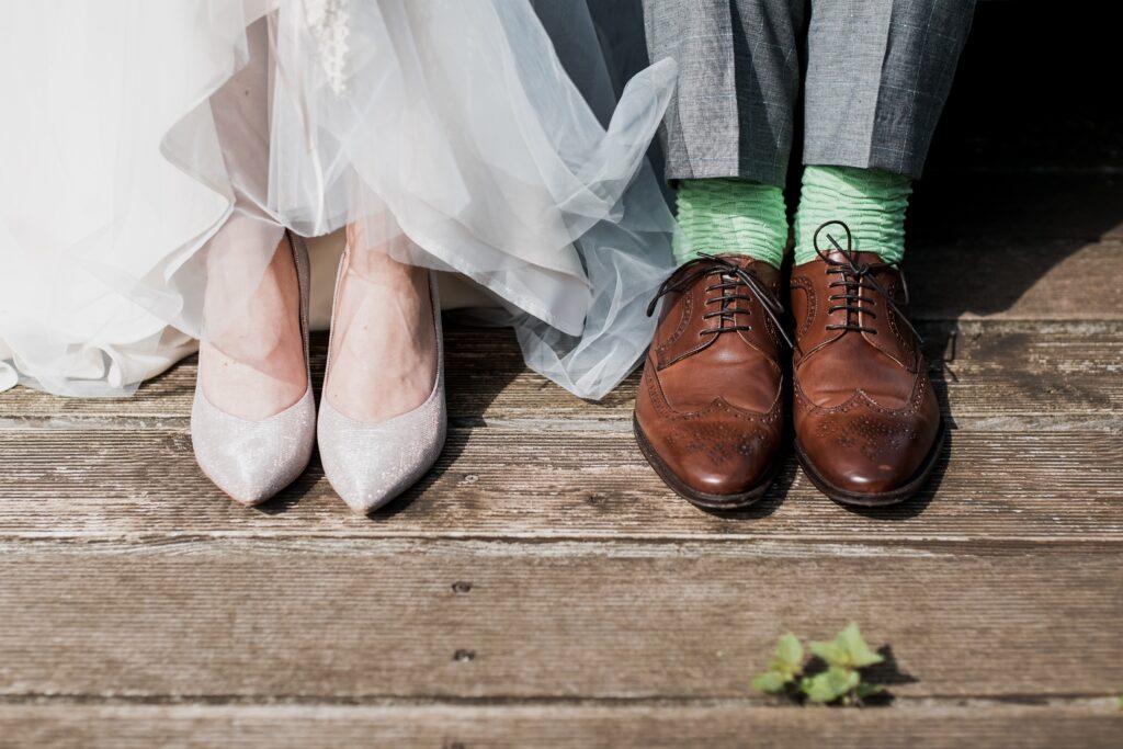 a bride and groom's shoes