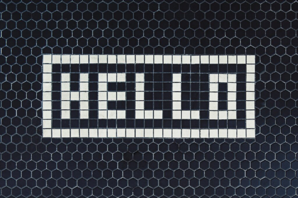 Mosaic tiles spelling out hello